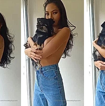 onlyfans model Ploytigerstam fondles her dog on her big tits