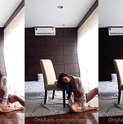 thaimodel Ploytigerstam sit on the sloor and poses for you,