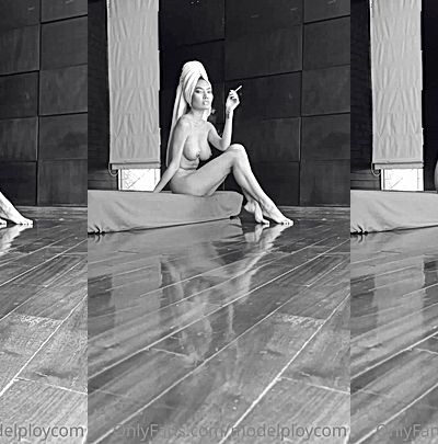 model Ploytigerstam looking good naked while she smokes