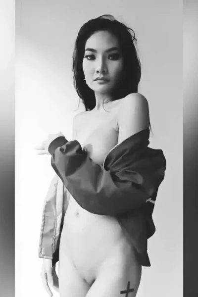 onlyfans model Ploytigerstam grabs her natural big boobs