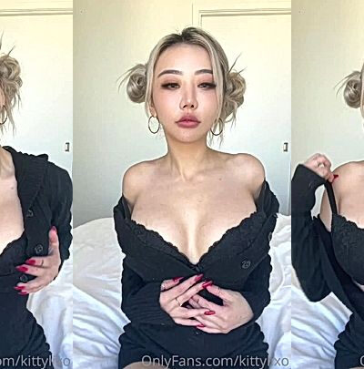 hot chick is having a great time taking her clothes off to please her fans
