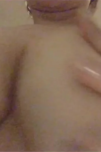 Anri Okitais having a great time showing her boobs to her fams