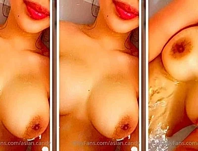 sexy onlyfans model Asian.candy rubs her natural boobs in the bathtub