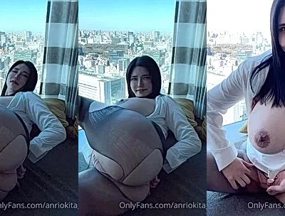 Anri Okita lifts her legs to show off her amazing butt