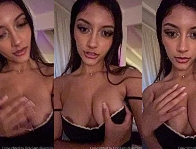 naughty hot girl Jasminx running her hands in circle playing with her boobs